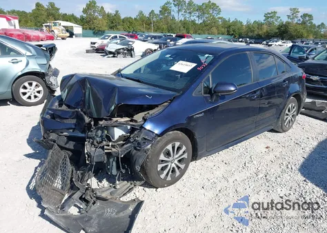 2021 Toyota Corolla Hybrid Le from USA, damaged, VIN JTDEAMDE9MJ003091